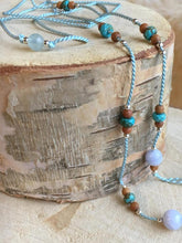 Load image into Gallery viewer, Throat Chakra Activating Silk Thread